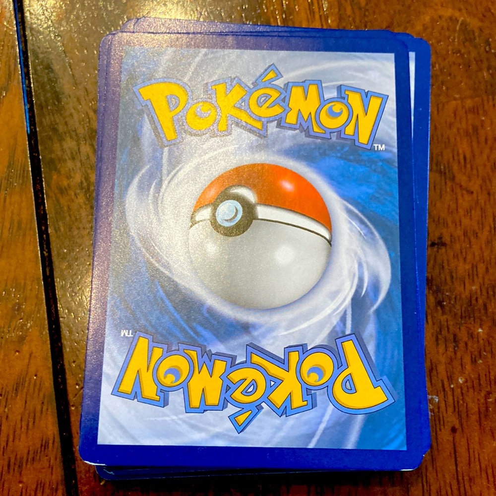 assorted lot of 50 pokemon cards